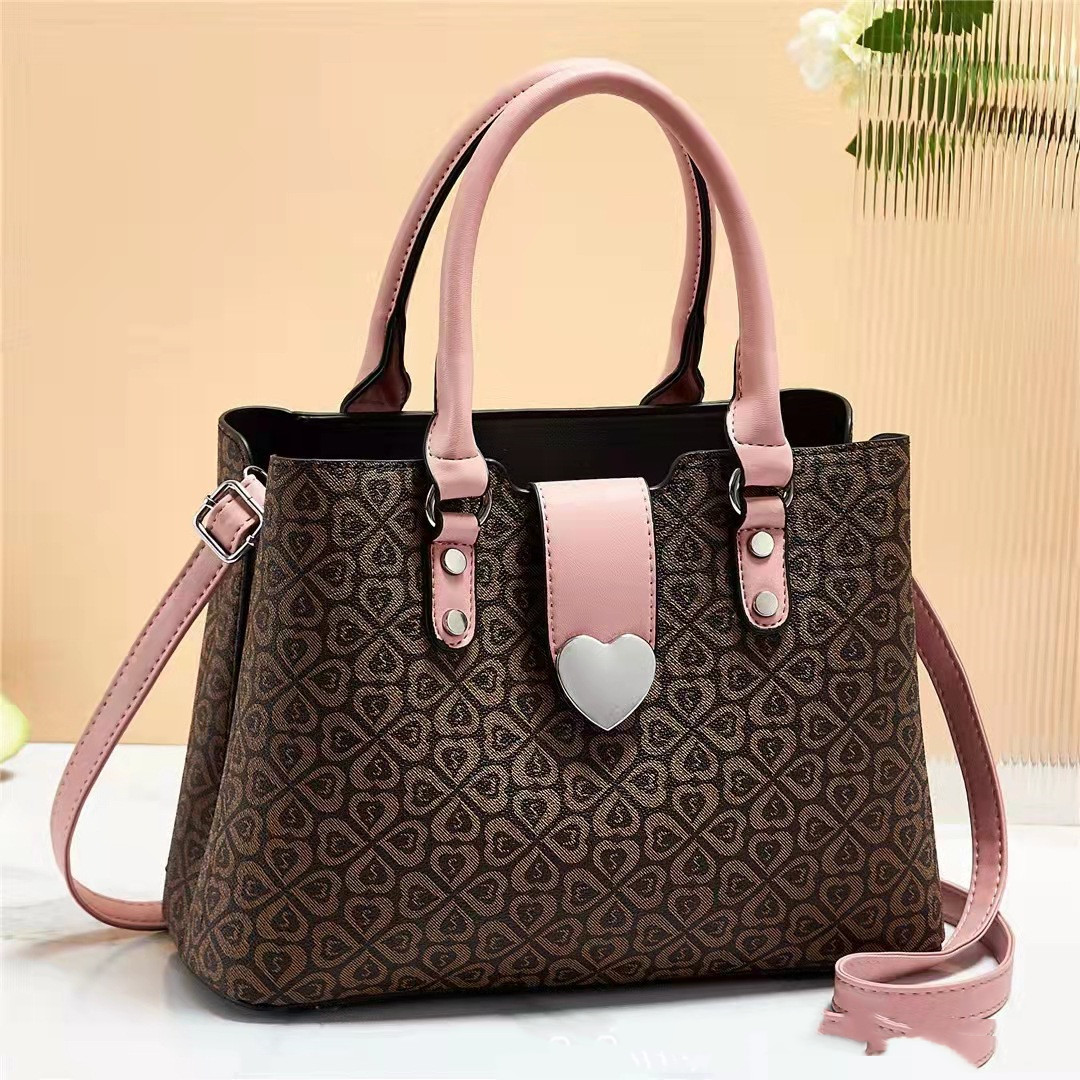 Elegant Heart Clasp Handbag with Pattern