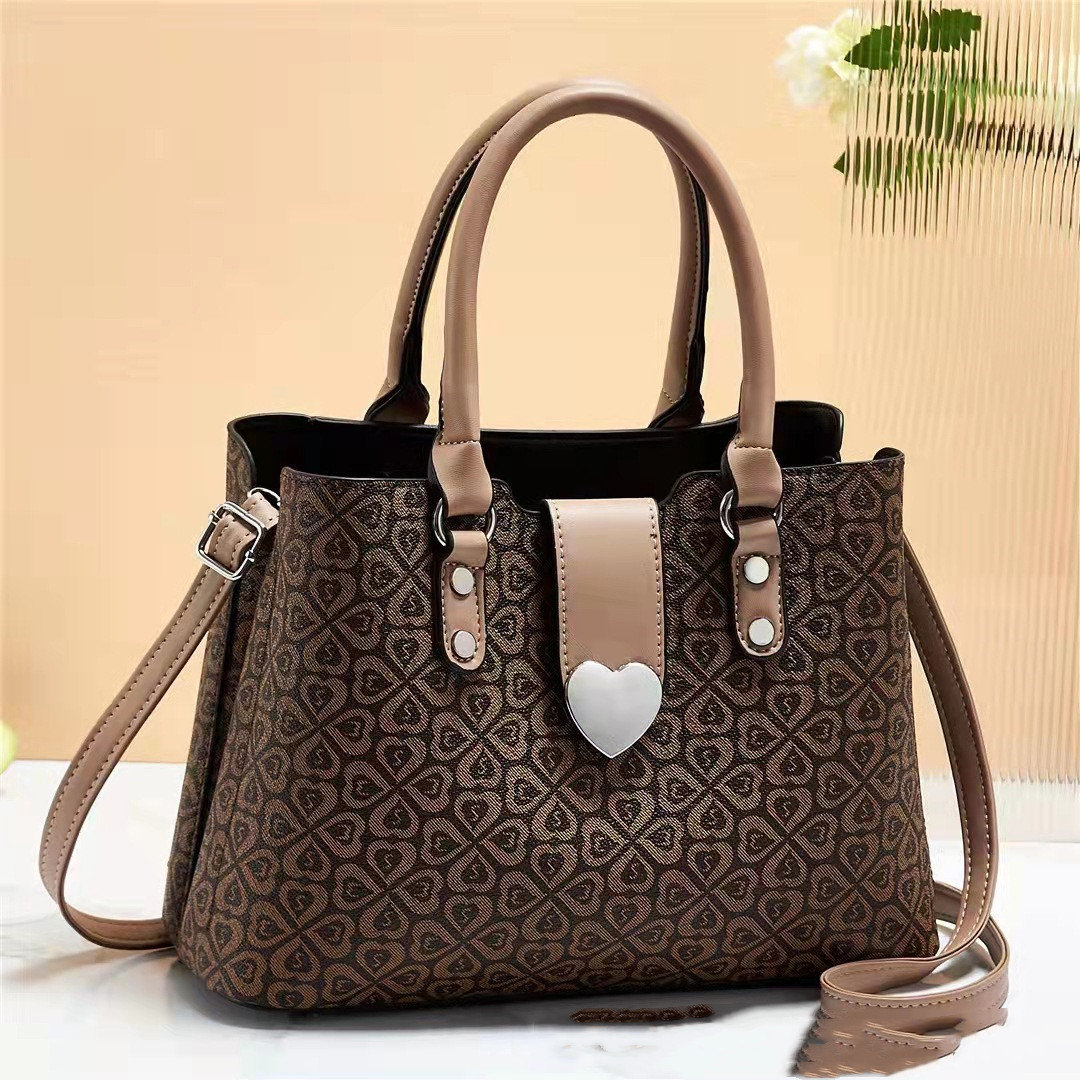 Elegant Heart Clasp Handbag with Pattern